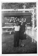 The Block Family at the Plaza Hotel - Woman and Child In Front of Sign